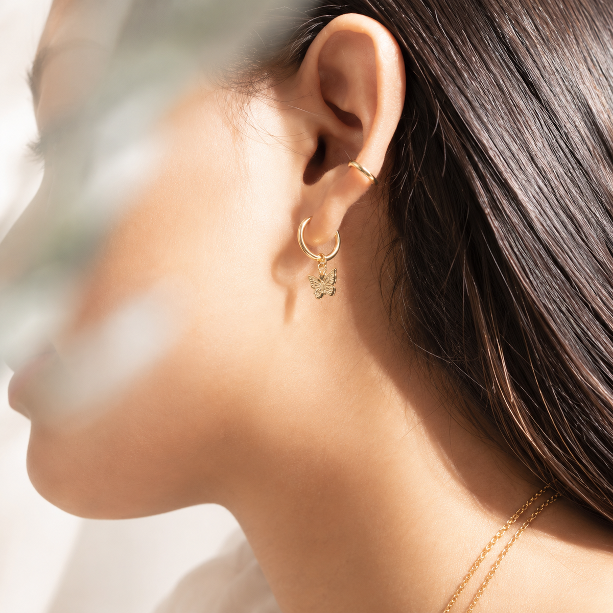 Butterfly Huggie Earrings – product image 7