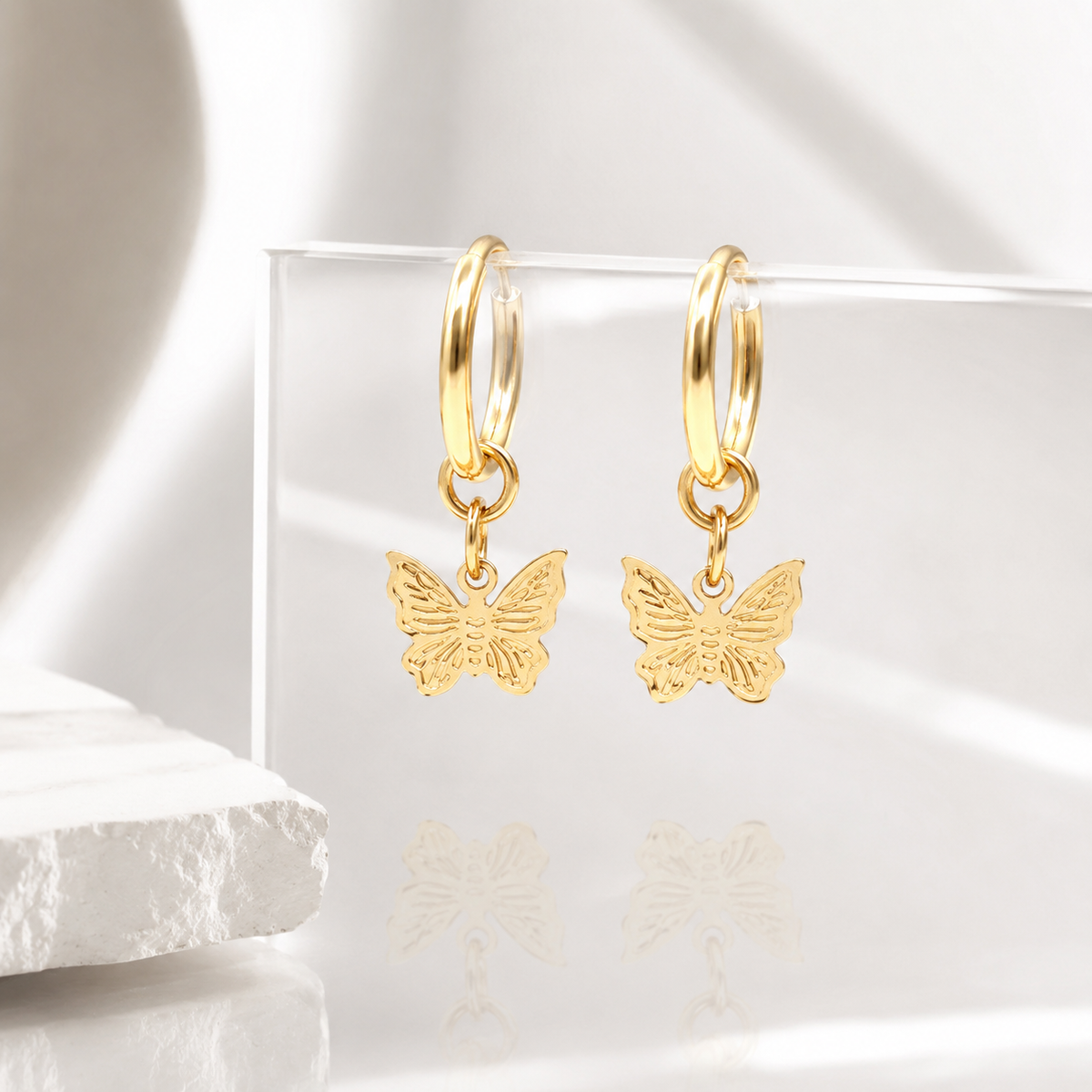 Butterfly Huggie Earrings – product image 3