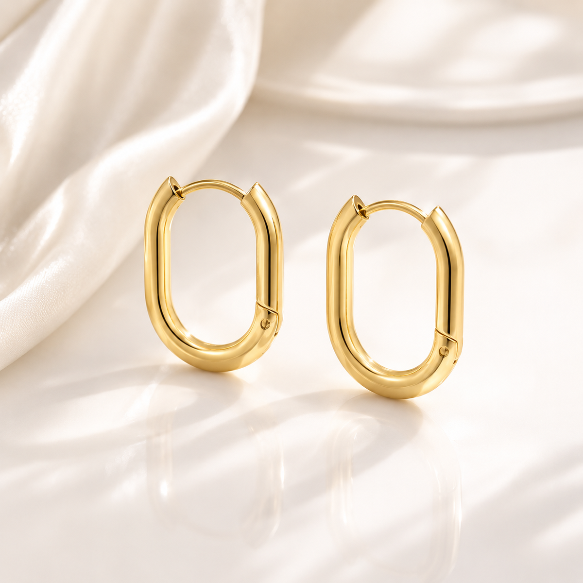 Oval Huggie Earrings – product image 1